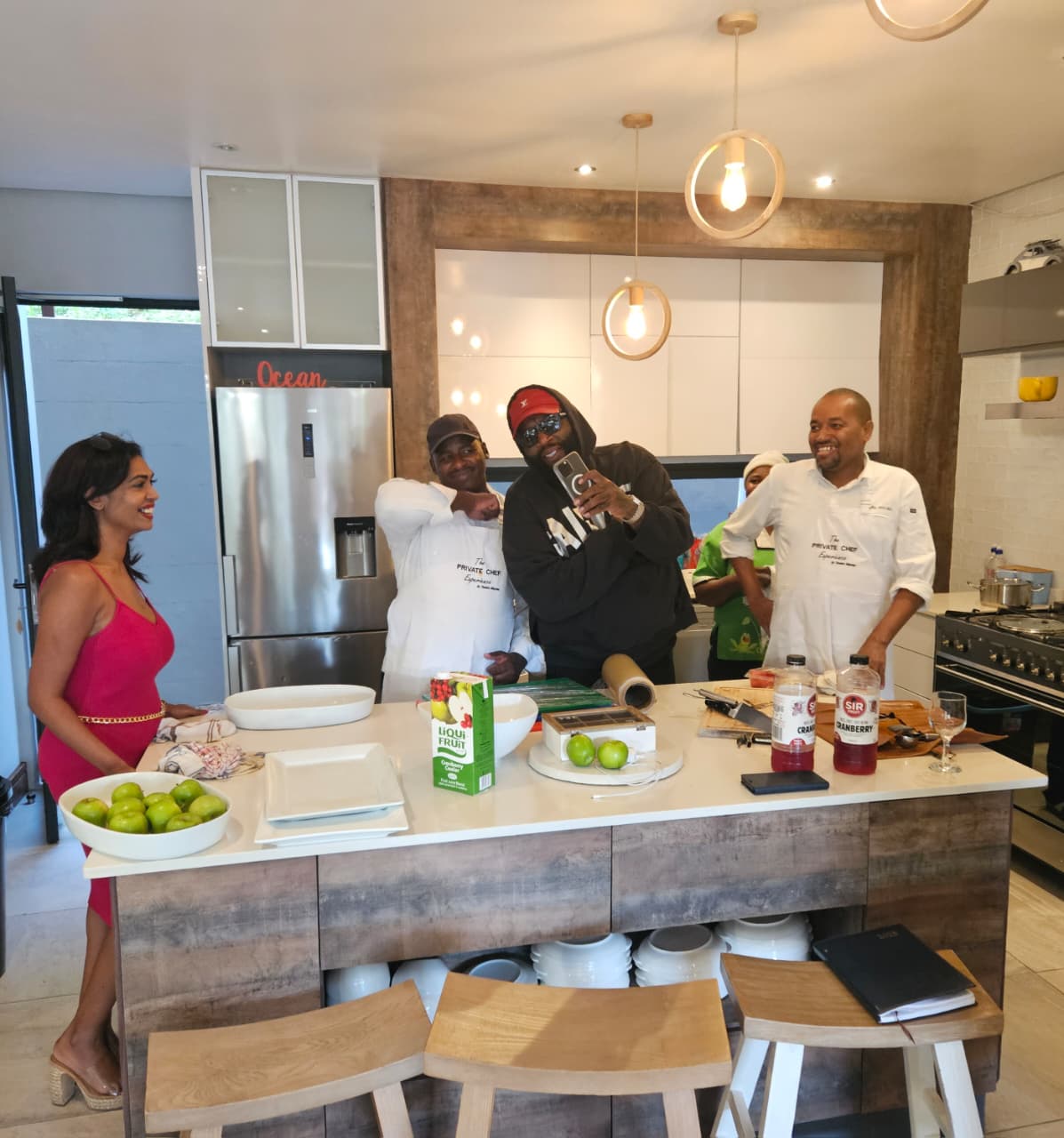 Rick Ross engaging with our Staff